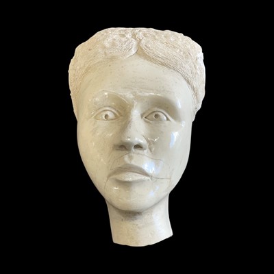 Lot 107 - A studio pottery mask, 35cm high.