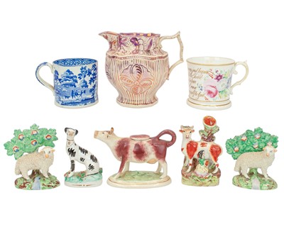 Lot 701 - A 19th century pink lustre jug.