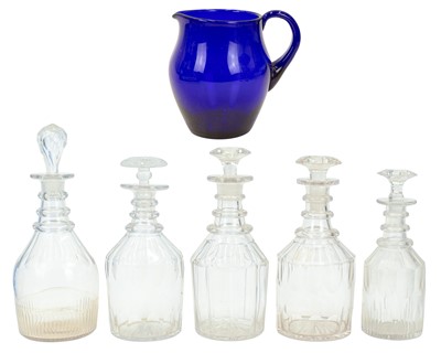 Lot 279 - A blue glass water jug of bellied form.