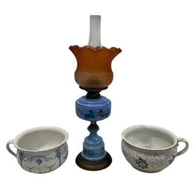 Lot 114 - A Victorian oil lamp with a blue glass...