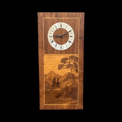 Lot 115 - A German-made inlaid quartz wall clock, 57cm...