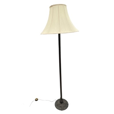 Lot 125 - A Brass standard lamp with a fabric shade....