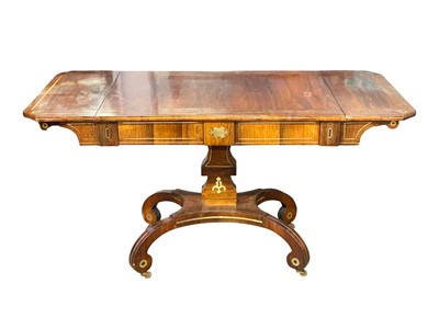 Lot 993 - A Regency brass inlaid rosewood sofa table.