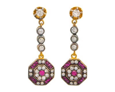 Lot 143 - A pair of gold, diamond and ruby pendant earrings.