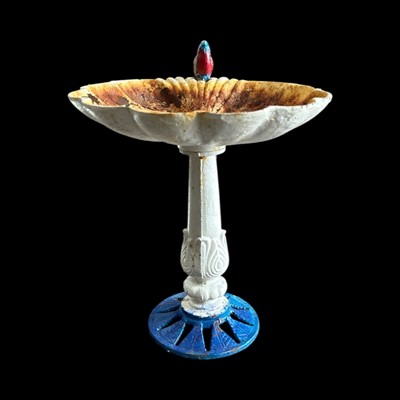 Lot 136 - A cast-iron bird bath, 34cm high.