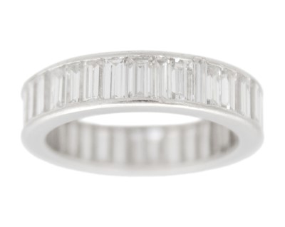 Lot 149 - A gentleman's platinum full eternity channel-set diamond band ring.