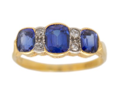 Lot 169 - An antique 18k gold, synthetic sapphire and diamond ring.