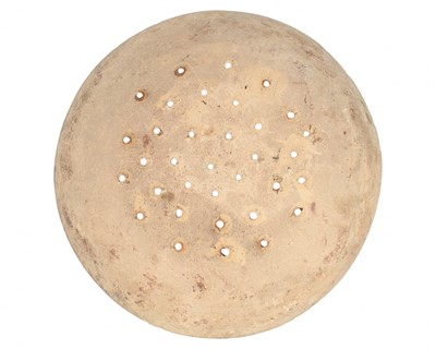 Lot 622 - An English slipware pottery colander or strainer dish.