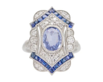 Lot 167 - An Art Deco-style platinum, sapphire and diamond panel dress ring.