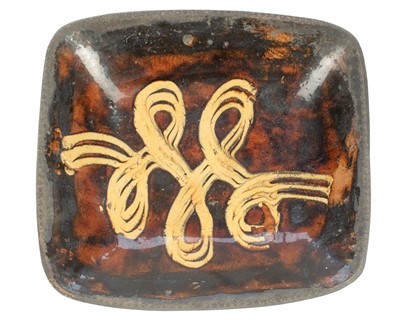 Lot 634 - A large slipware baking or loaf dish.