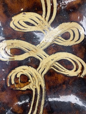 Lot 634 - A large slipware baking or loaf dish.