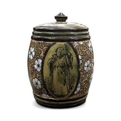 Lot 144 - A Doulton Lambeth tobacco jar, 13cm tall.