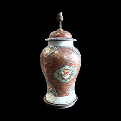 Lot 119 - A Japanese lidded jar converted to a lamp base....