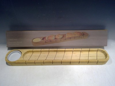 Lot 182 - A Lakeland Baguette serving Board. The Board...