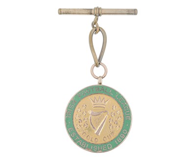 Lot 1122 - A George V Irish 9k rose gold and green enamel football medal watch fob.