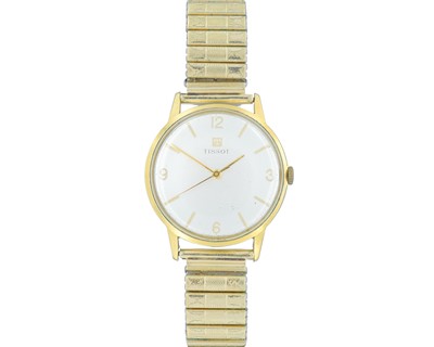 Lot 1065 - TISSOT - A gold-plated gentleman's manual wind dress wristwatch.