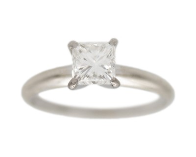 Lot 196 - A 14K white gold diamond solitaire ring.
