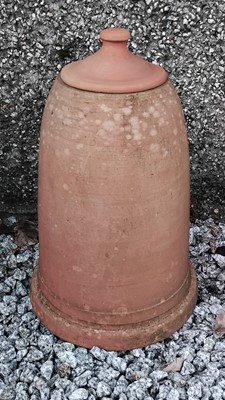 Lot 872 - A terracotta rhubarb forcer with lid.