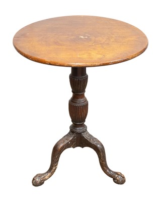 Lot 989 - A mahogany tripod table.