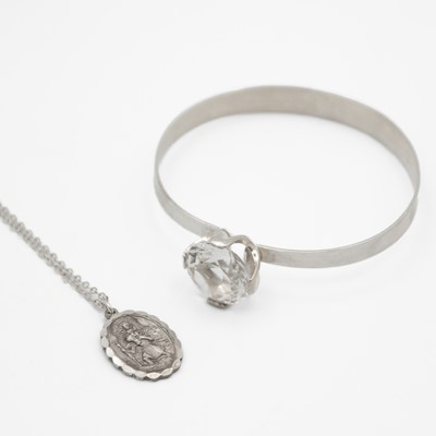 Lot 3 - A Georg Jensen St Christopher pendant necklace and Swedish silver with a rock crystal bangle by Bengt Hallbert