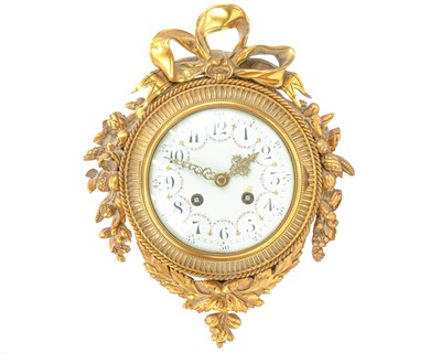 Lot 888 - A French ormolu cartel clock.