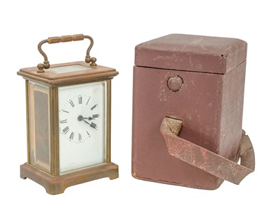 Lot 885 - A French brass carriage timepiece.