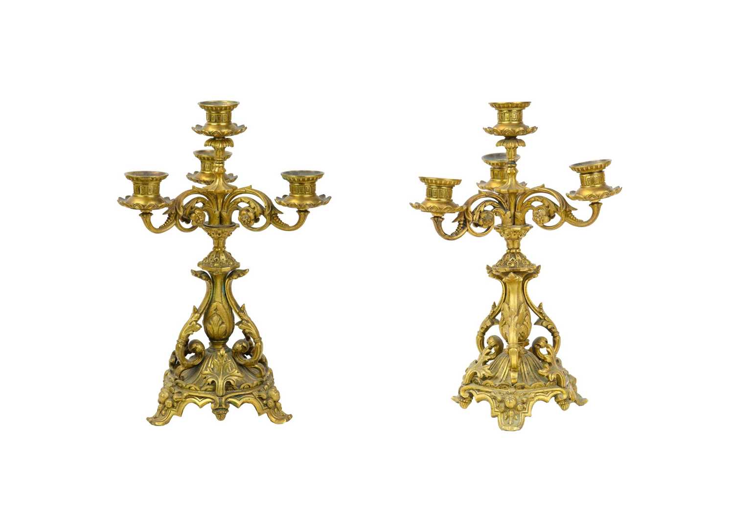 Lot 34 - A pair of French ormolu three branch candelabra.