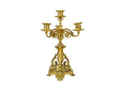 Lot 34 - A pair of French ormolu three branch candelabra.