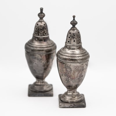 Lot 232 - A Victorian silver pair of pedestal pepper casters by Walter & John Barnard.