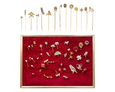 Lot 184 - A collection of gold, gold-plated and silver stick pins.