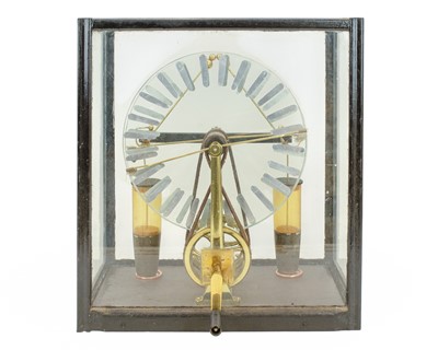 Lot 112 - A cased electrostatic generator or Wimshurst machine.
