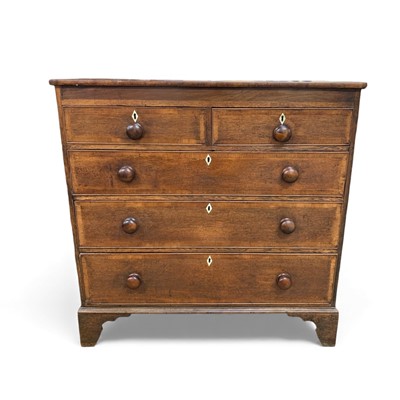 Lot 657 - A 19th century oak and crossbanded chest.