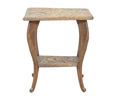 Lot 368 - A Japanese Arts & Crafts two tier carved softwood occasional table.