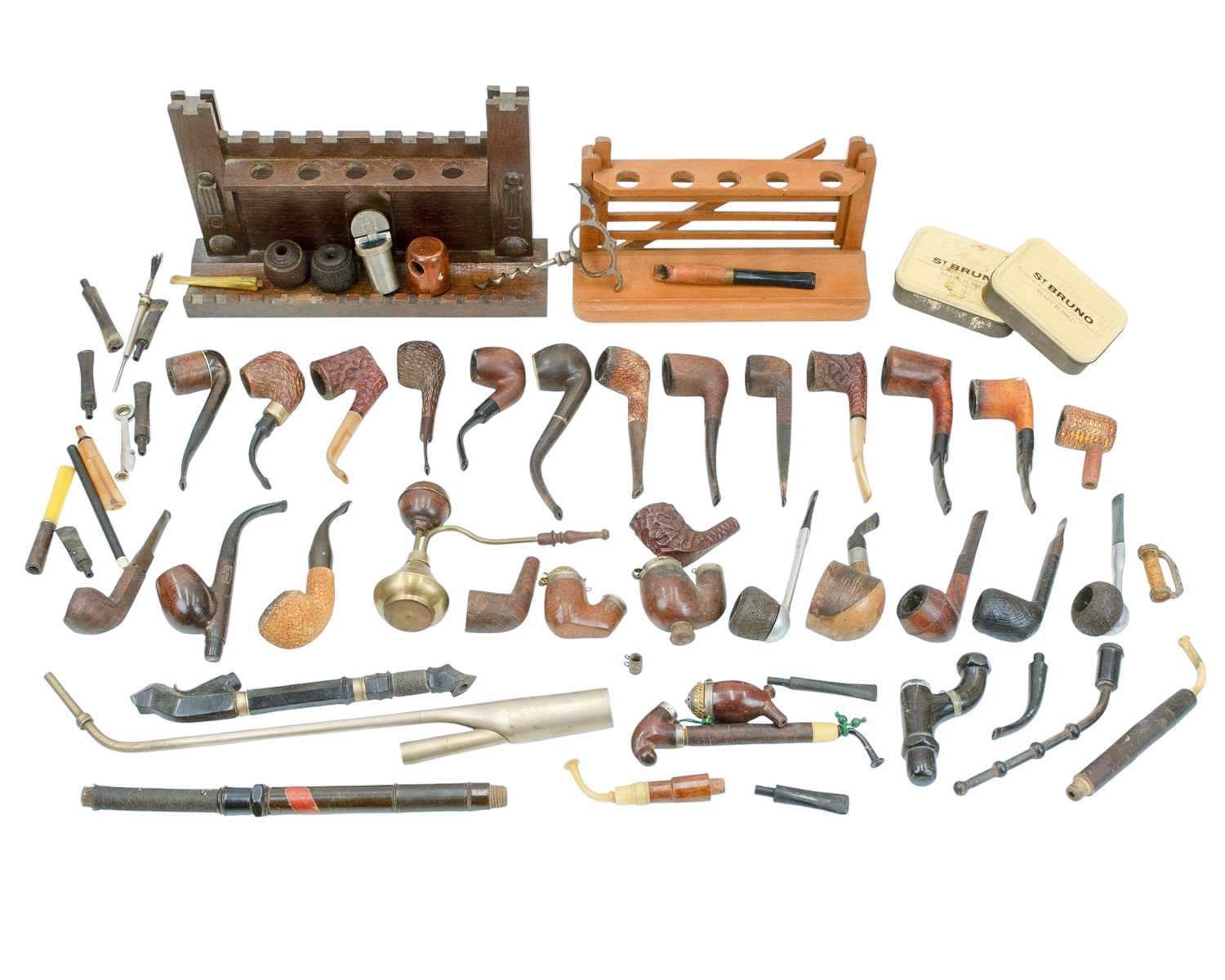 Lot 20 - A castellated oak pipe rest, width 29cm.