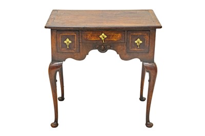 Lot 654 - A George II style walnut lowboy.