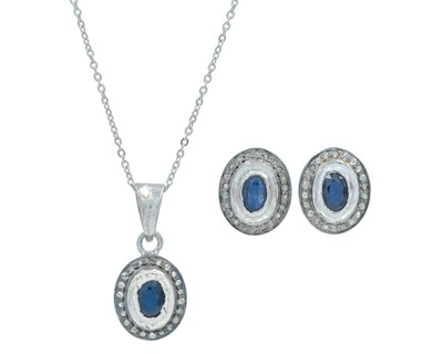 Lot 208 - An oval sapphire and diamond halo stud earring and pendant necklace suite, set in silver.