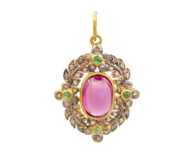 Lot 193 - A Victorian-style silver gilt, almandine garnet, diamond, and emerald pendant.