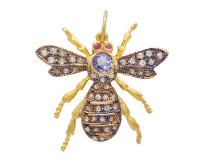 Lot 199 - A Victorian-style tanzanite, diamond, and red spinel bee pendant.