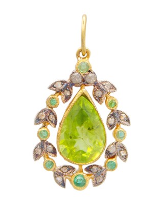 Lot 219 - A silver gilt, peridot, diamond, and emerald pendant.