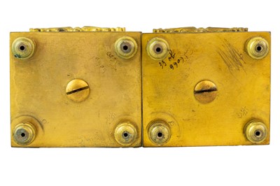 Lot 22 - A pair of orange siena marble candlesticks.