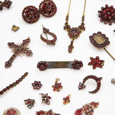 Lot 43 - A selection of small silver and base metal garnet jewellery items.