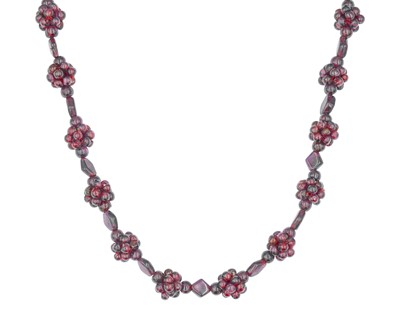 Lot 245 - An almandine garnet cluster bead necklace.
