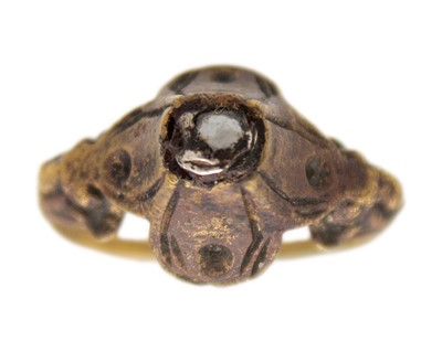 Lot 230 - A rare 15th or 16th century bronze finger ring set with a point cut white stone.