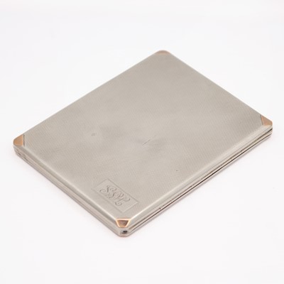 Lot 227 - A George V silver cigarette case with engine turned decoration and rose gold corners.