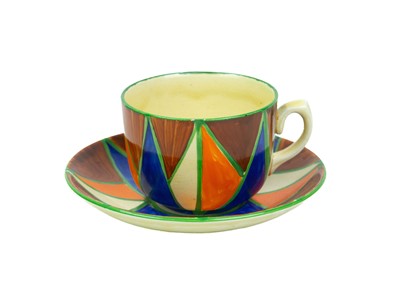 Lot 238 - A Clarice Cliff Original Bizarre pattern tea cup and saucer.