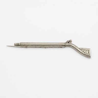 Lot 145 - A rare early Victorian silvered combination propelling pencil and toothpick fob in the form of a flintlock Baker rifle.