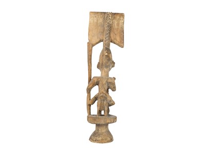 Lot 9 - A carved tribal figure.