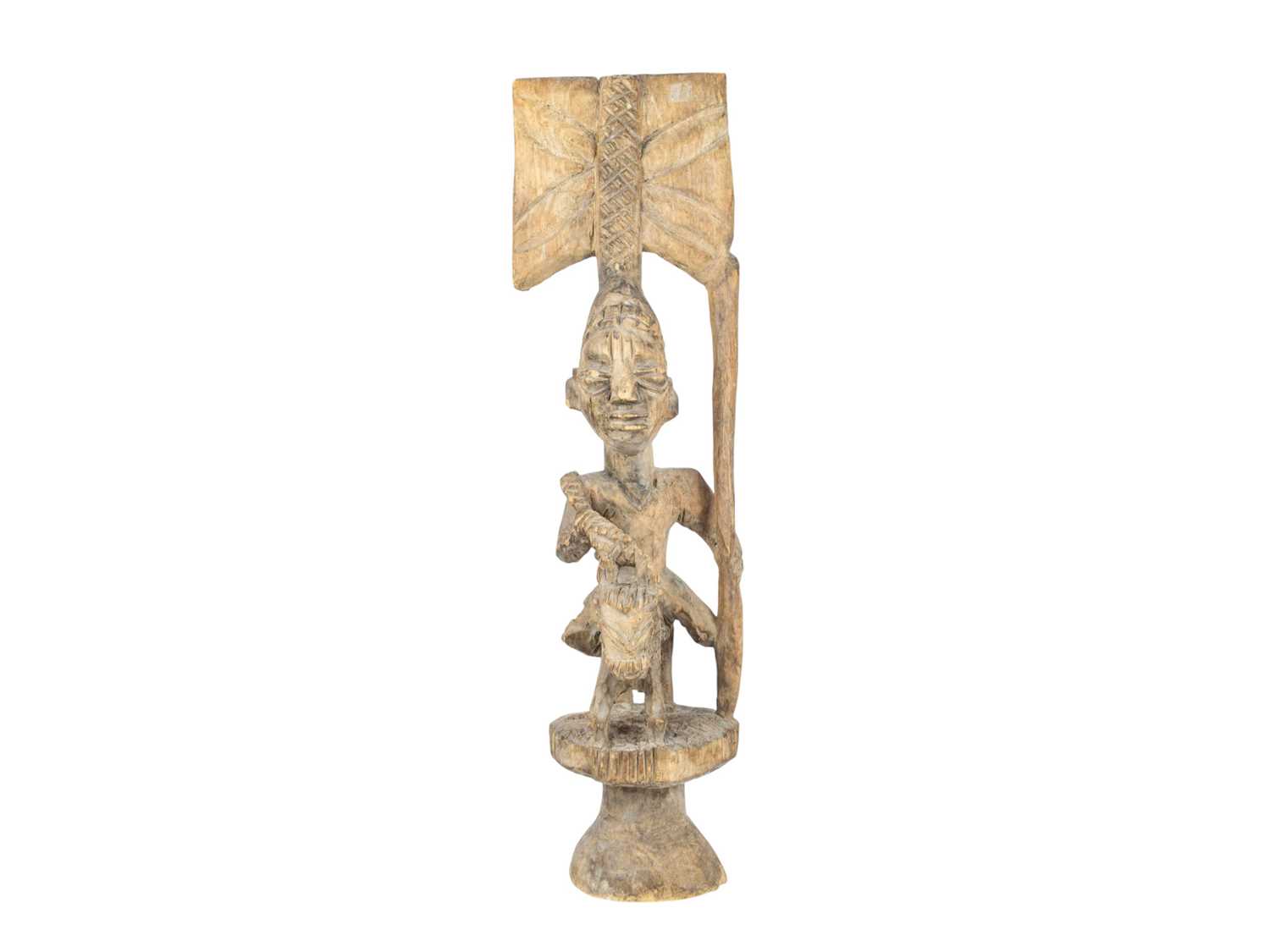 Lot 9 - A carved tribal figure.