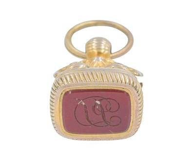 Lot 1125 - A Georgian gold fob seal, with gilt metal split ring suspension.