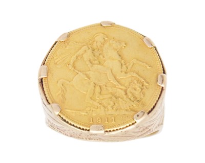 Lot 222 - A full sovereign 1911 coin, set in a 9k ring.
